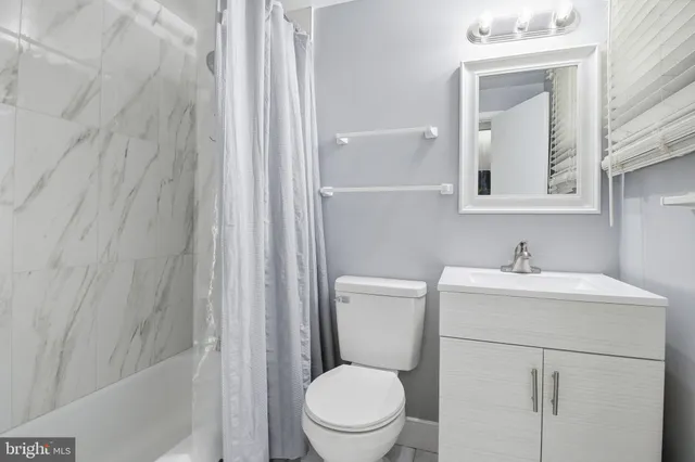 a view of a house with small yard