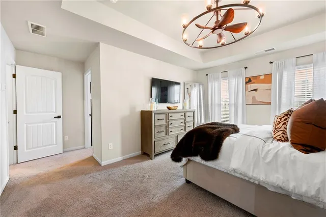 a bedroom with furniture and a window