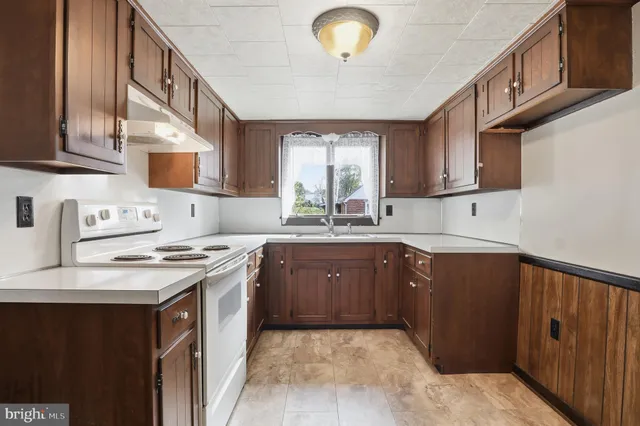 a room with furniture and a mirror