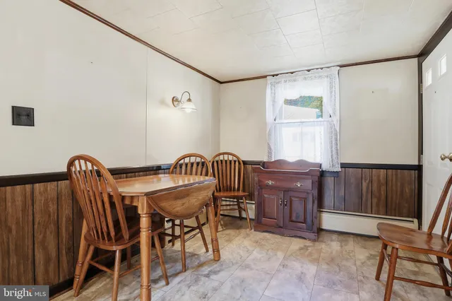 a backyard of a house with large trees