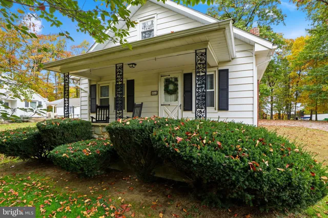 a view of balcony with furniture and wooden floor