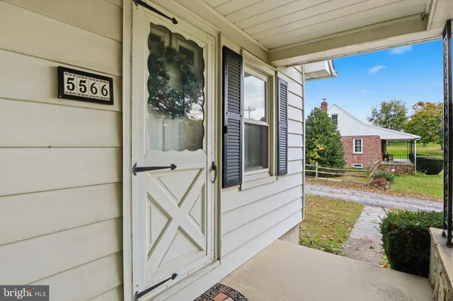 a kitchen with a sink cabinets and window