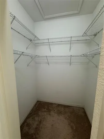 a view of a room with racks on the wall