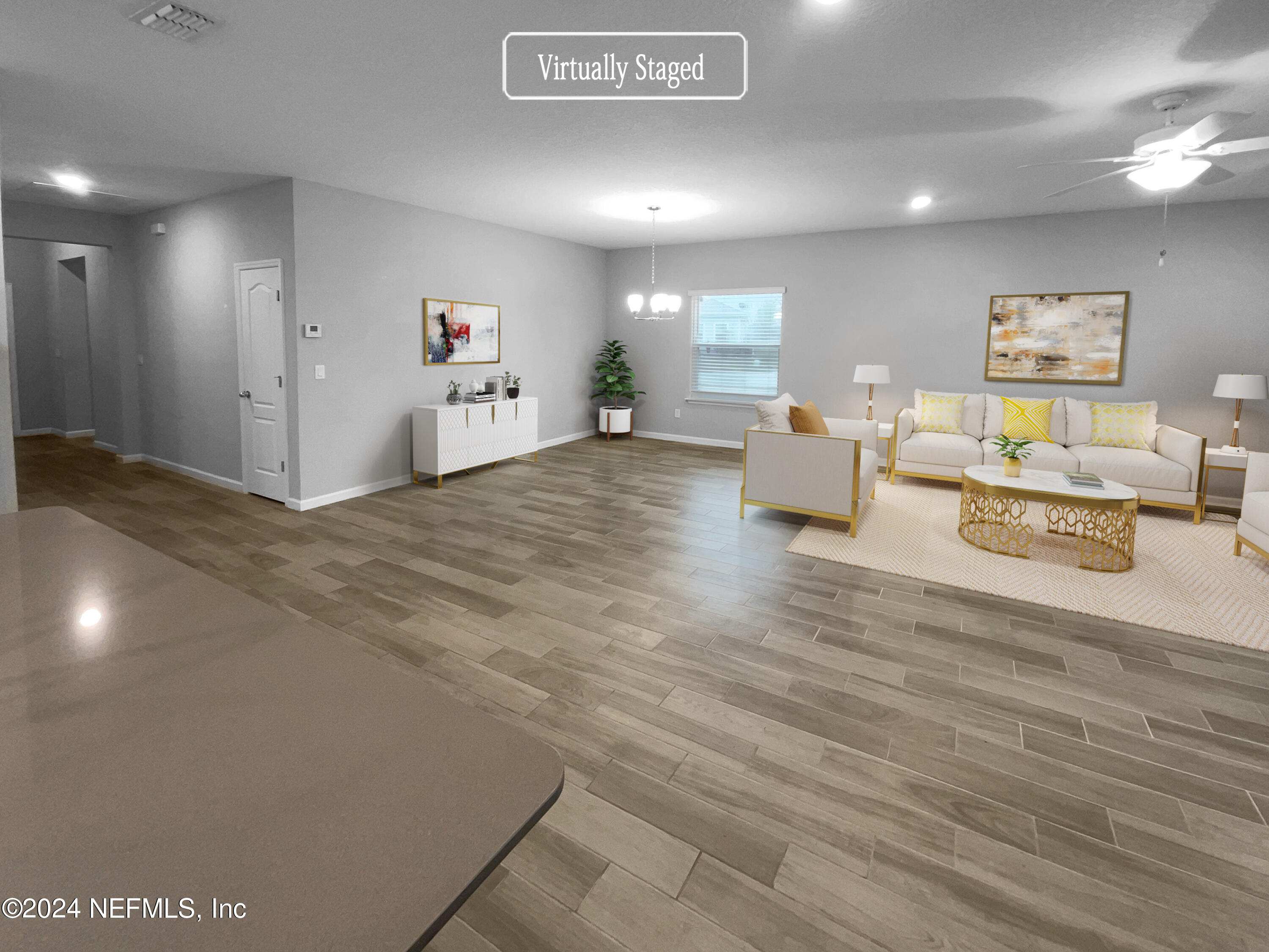 188 Bloomfield Way St. Augustine, FL 32092 - Photo 2 of 18 a living room with furniture and a wooden floor