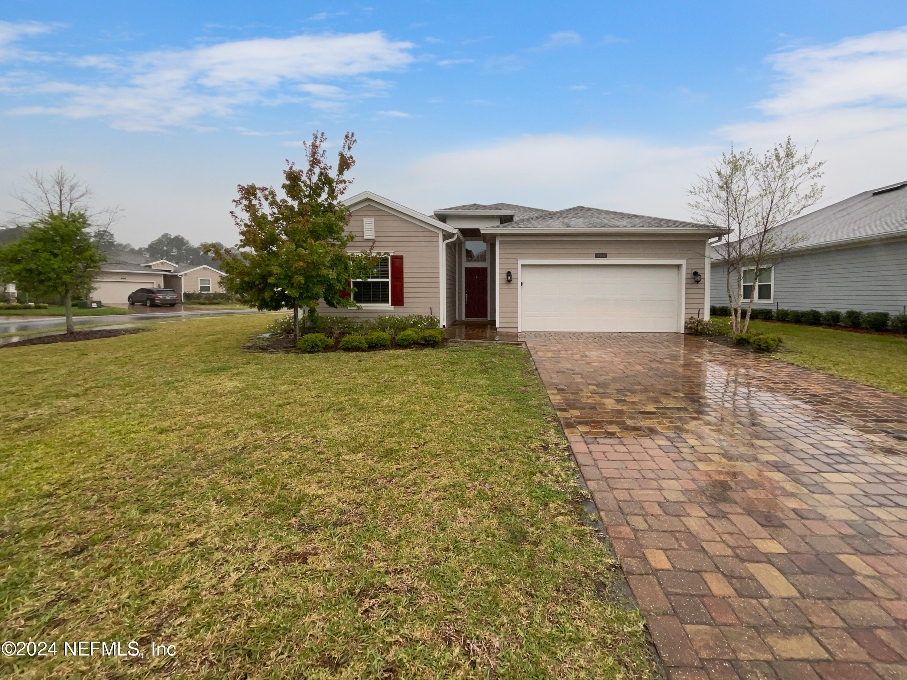 188 Bloomfield Way St. Augustine, FL 32092 - Photo 7 of 18 a view of a house with a yard and garage