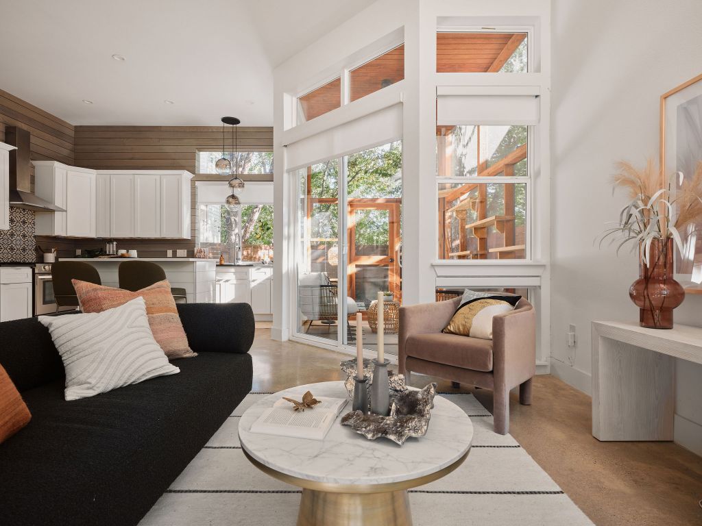 2806 Lyons Road, Unit 1 Austin, TX 78702 - Photo 11 of 39 a living room with furniture and a large window