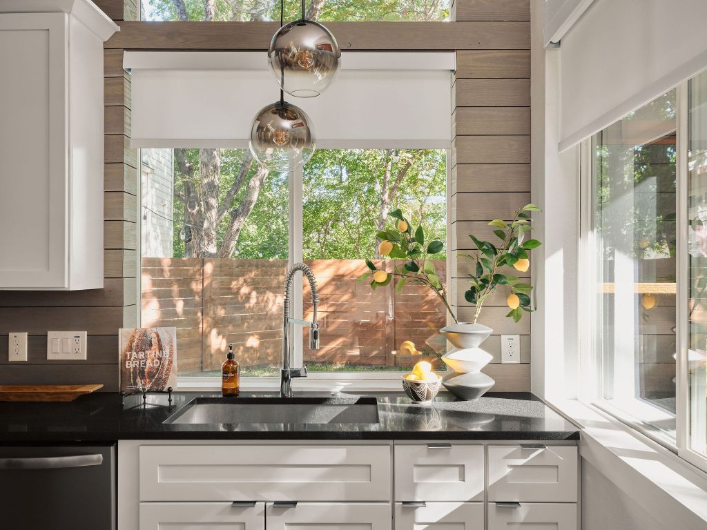 2806 Lyons Road, Unit 1 Austin, TX 78702 - Photo 12 of 39 a kitchen with a window and cabinets