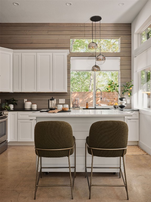2806 Lyons Road, Unit 1 Austin, TX 78702 - Photo 13 of 39 a kitchen with a table chairs cabinets and window