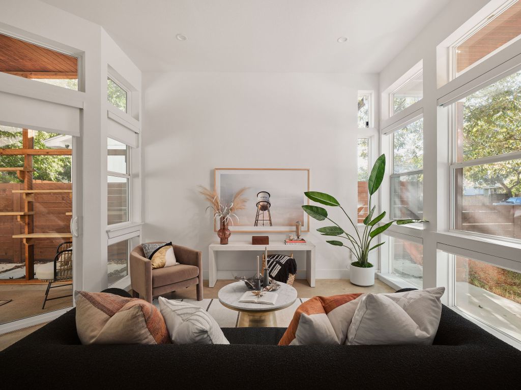 2806 Lyons Road, Unit 1 Austin, TX 78702 - Photo 4 of 39 a living room with furniture and a large window
