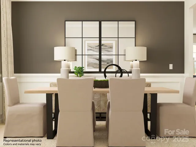 a dining room with a table and a lamp