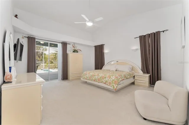 an aerial view of residential house with outdoor space and lake view