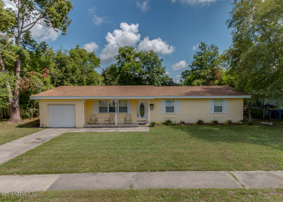 6615 Diane Road Jacksonville, FL 32277 - Photo 1 of 23 a front view of house with yard and green space