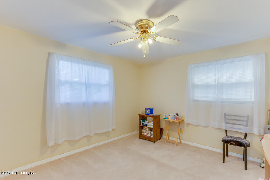 6615 Diane Road Jacksonville, FL 32277 - Photo 17 of 23 a view of an empty room with a window