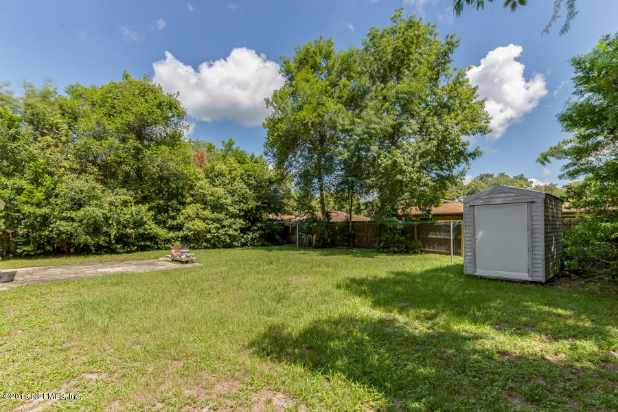 6615 Diane Road Jacksonville, FL 32277 - Photo 20 of 23 a view of a garden with a house