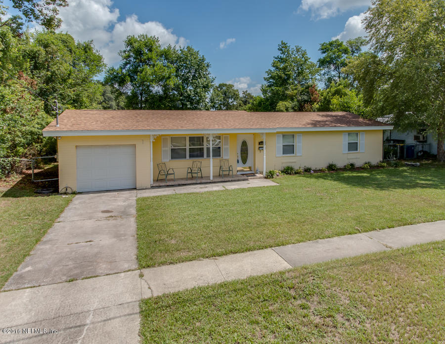 6615 Diane Road Jacksonville, FL 32277 - Photo 2 of 23 a front view of house with yard and green space