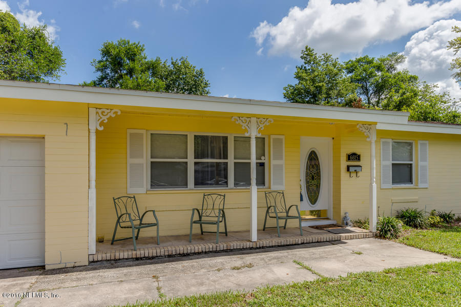 6615 Diane Road Jacksonville, FL 32277 - Photo 6 of 23 a front view of a house having yard