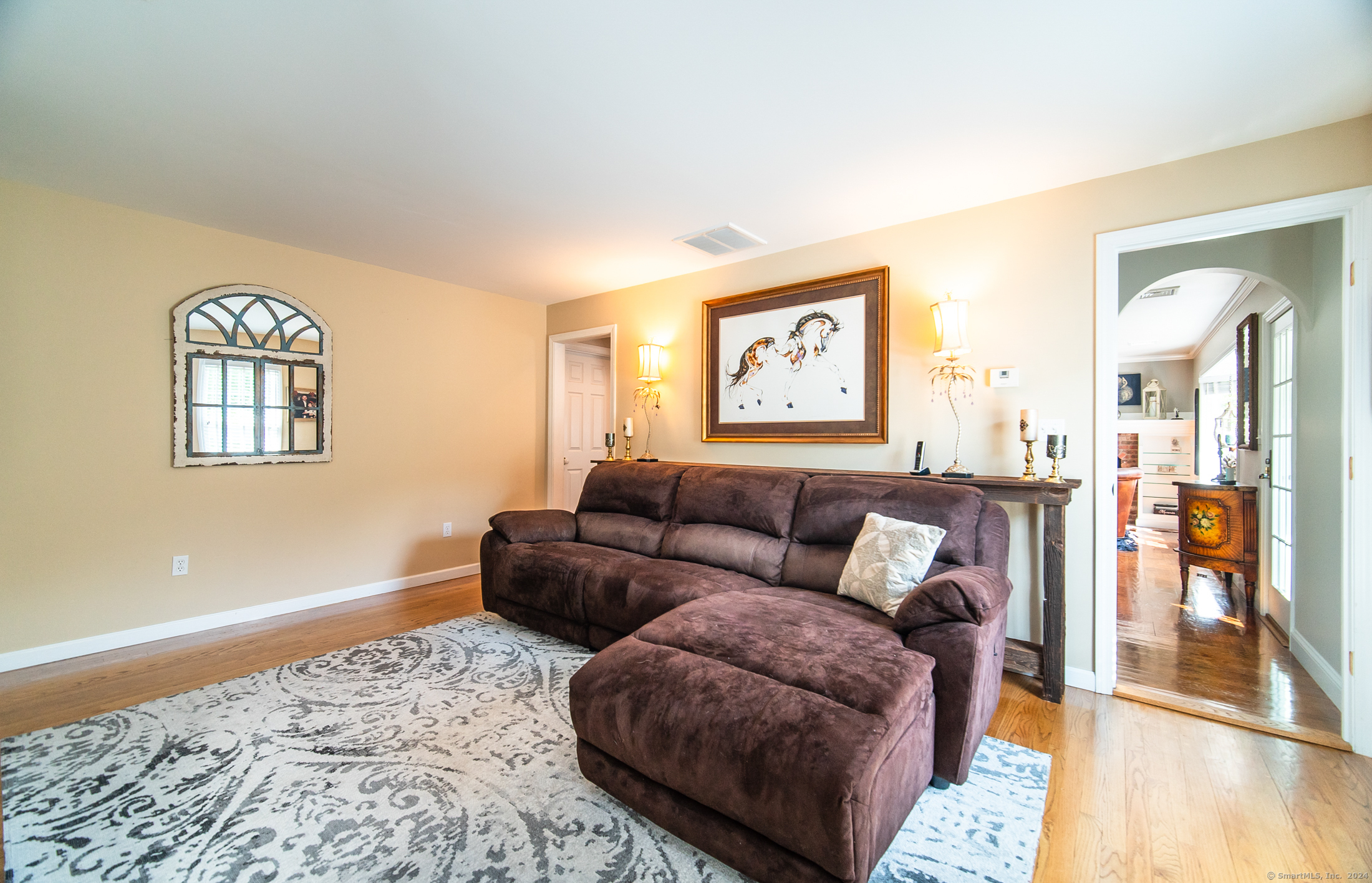 558 North Roast Meat Hill Road Killingworth, CT 06419 - Photo 15 of 37 a living room with furniture and painting on the wall