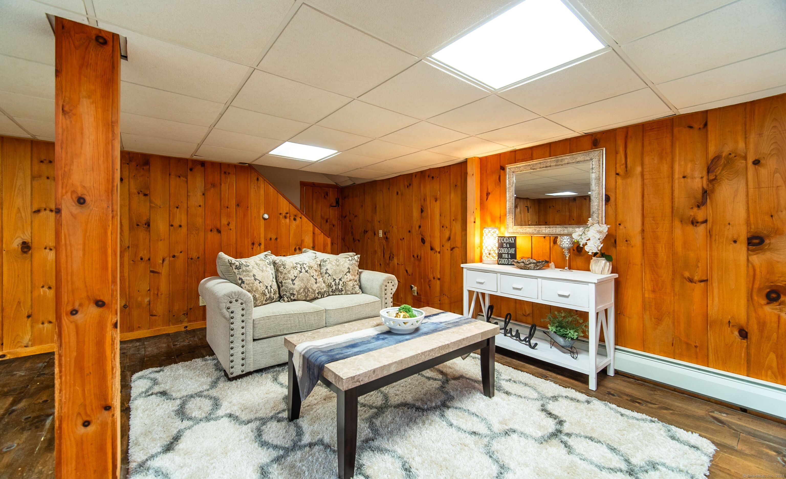 558 North Roast Meat Hill Road Killingworth, CT 06419 - Photo 25 of 37 a living room with furniture and a fireplace