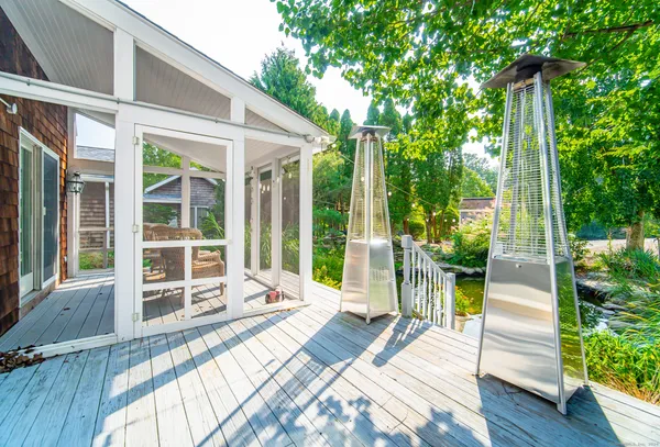 a view of a two chairs in the patio