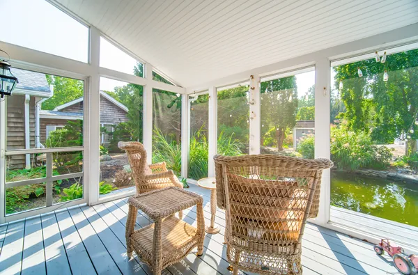 a living room with large windows