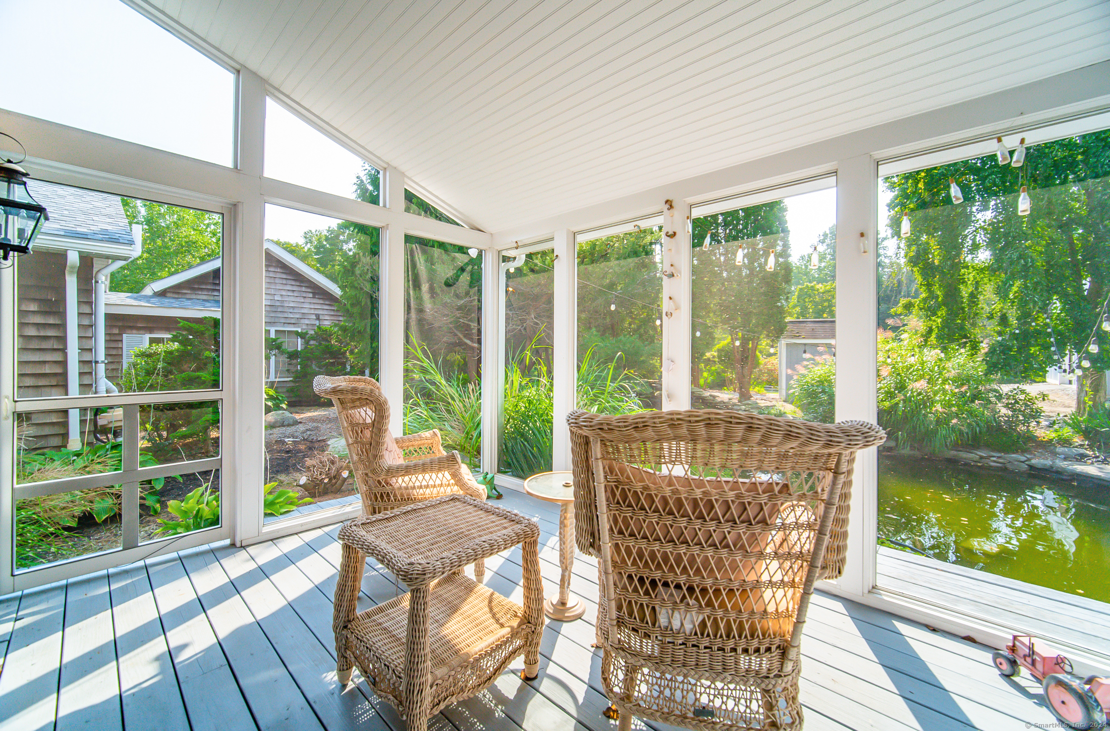 558 North Roast Meat Hill Road Killingworth, CT 06419 - Photo 35 of 37 a living room with large windows