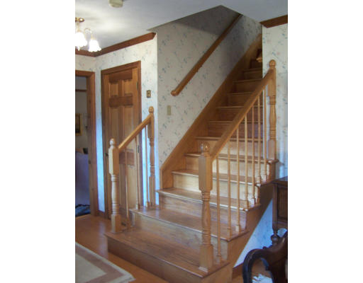 22 Hiller Road Rochester, MA 02770 - Photo 8 of 17 a view of entryway and hall with wooden floor