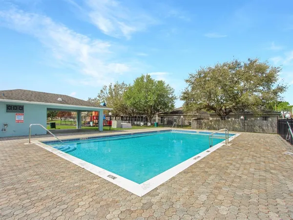 a view of a house with swimming pool