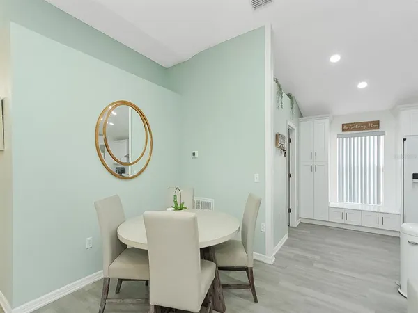 a bathroom with a sink a mirror and a toilet