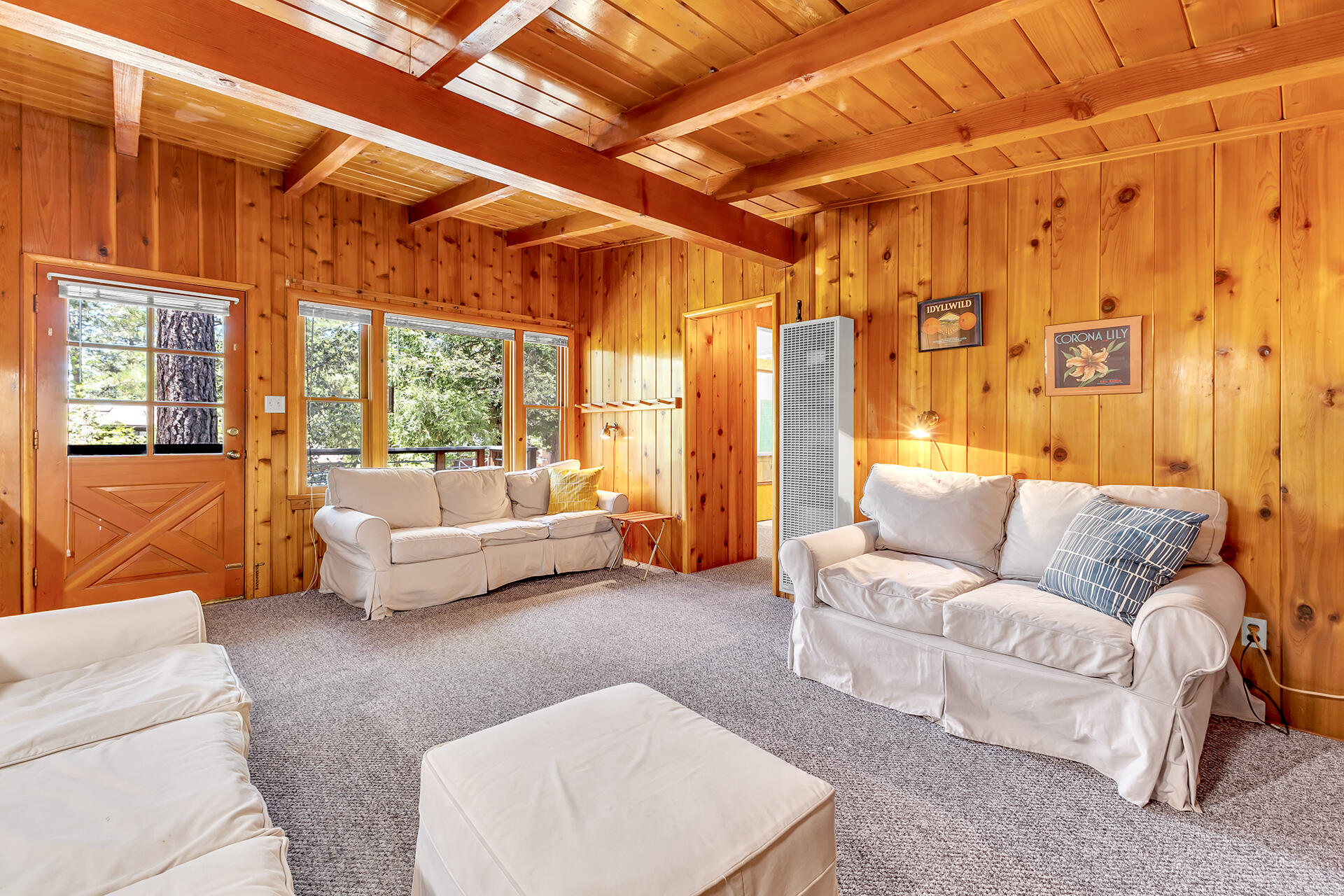 25270 Palomar Road Idyllwild, CA 92549 - Photo 11 of 60 a living room with furniture and a large window