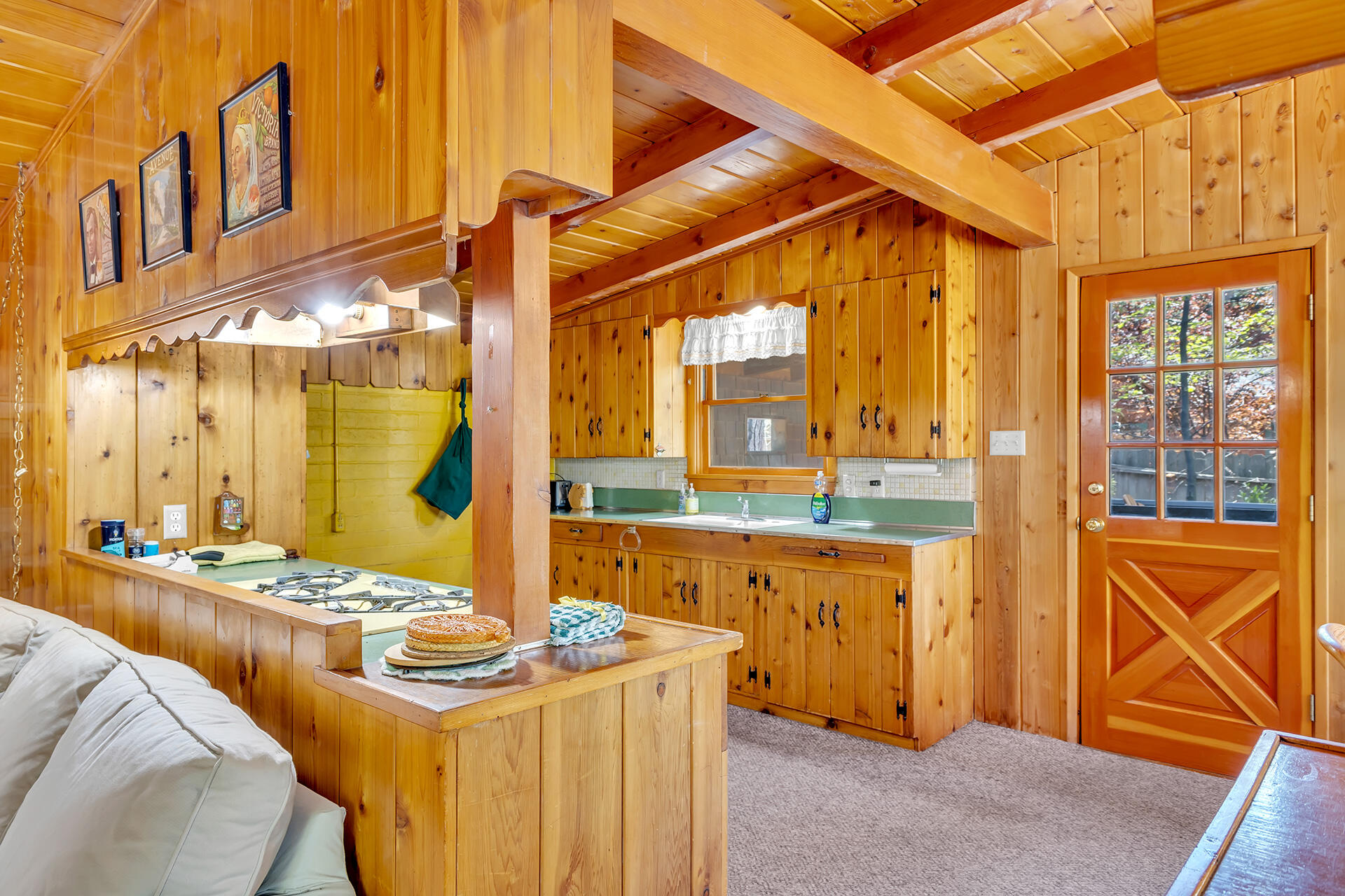 25270 Palomar Road Idyllwild, CA 92549 - Photo 13 of 60 a view of a kitchen with granite countertop a sink and cabinets