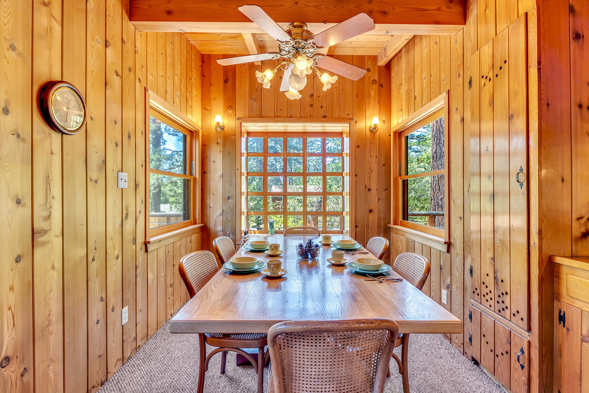 25270 Palomar Road Idyllwild, CA 92549 - Photo 20 of 60 a view of a dining room with furniture and window