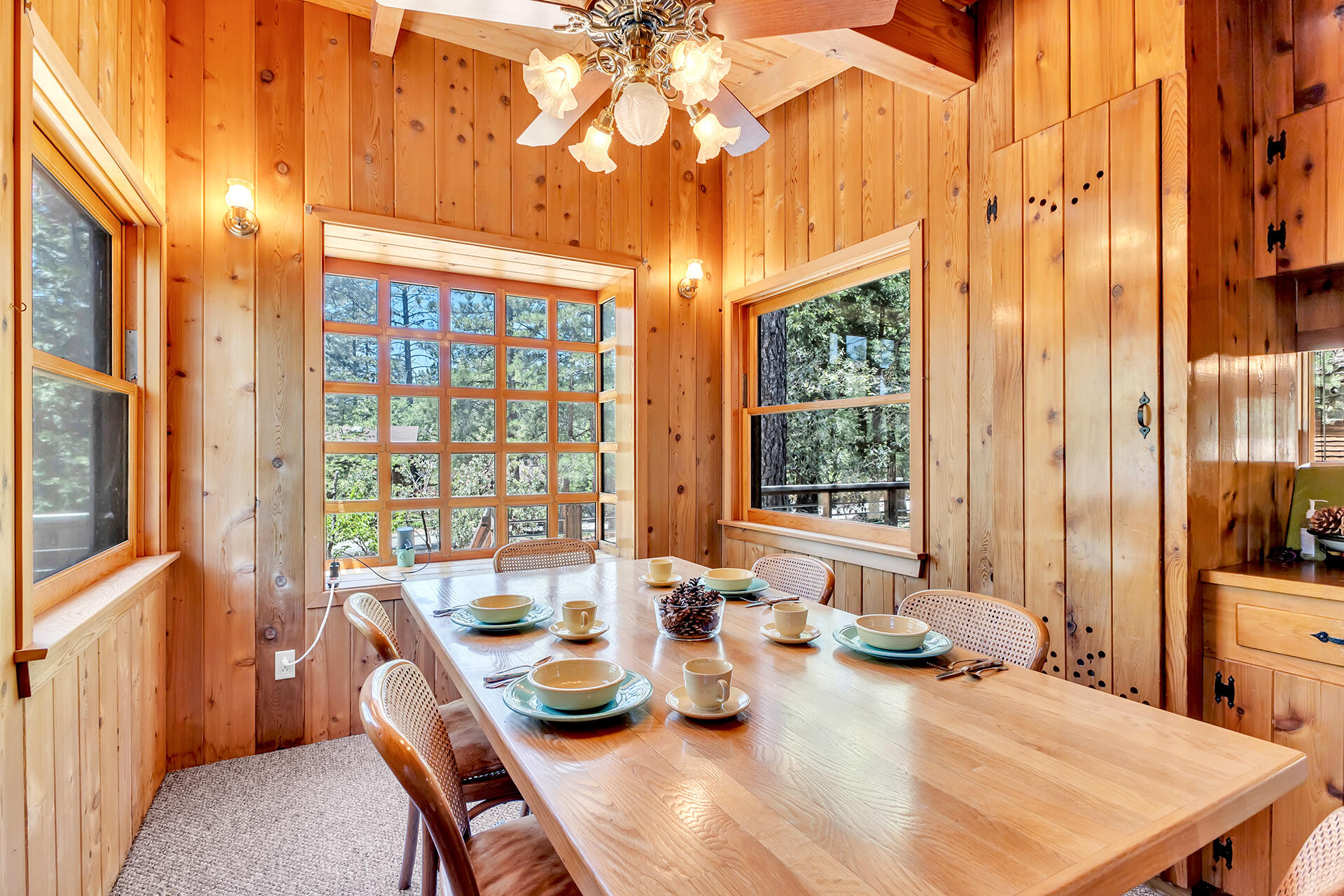25270 Palomar Road Idyllwild, CA 92549 - Photo 22 of 60 a view of a dining room with furniture window and outside view
