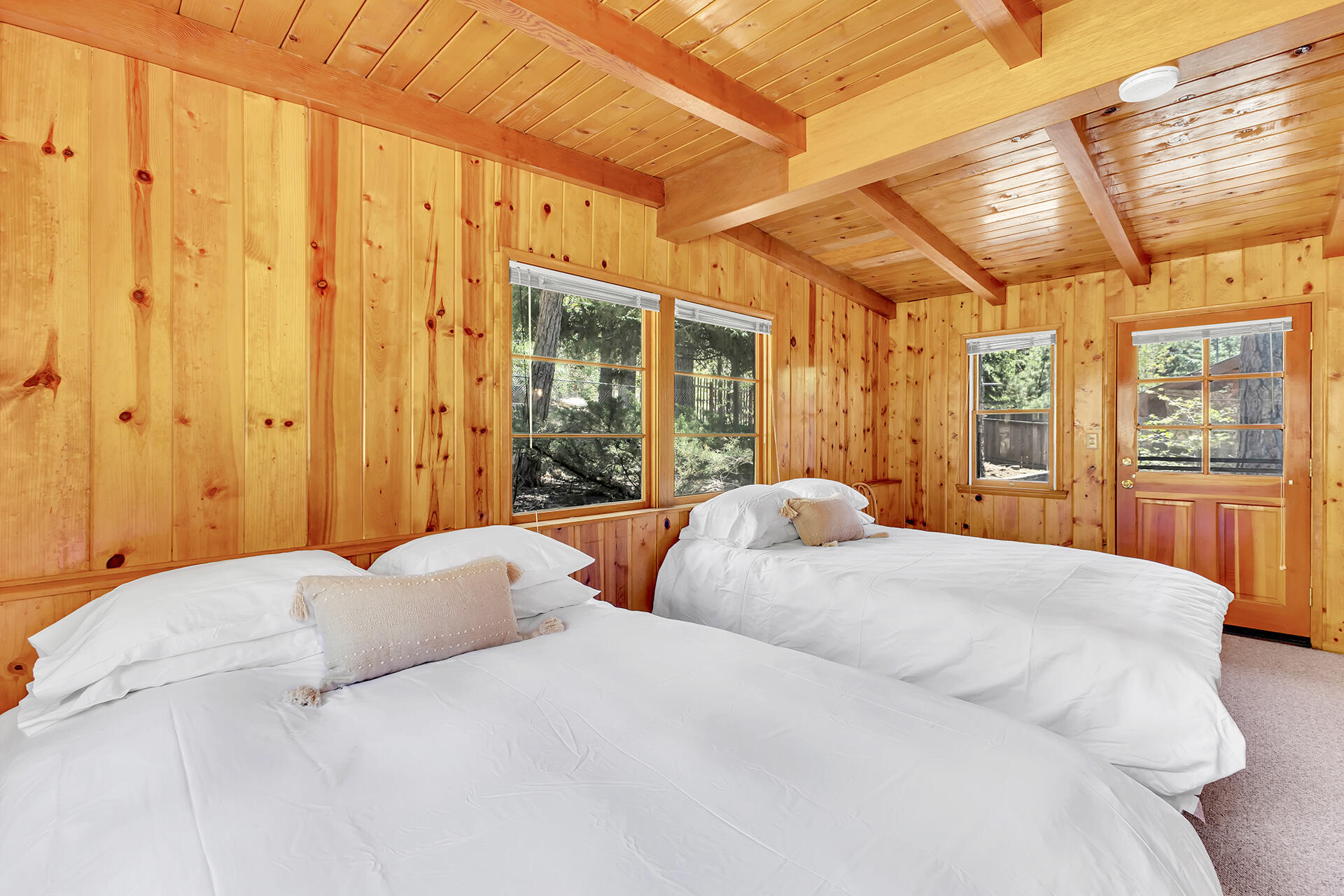 25270 Palomar Road Idyllwild, CA 92549 - Photo 31 of 60 a bedroom with a large bed and a large window