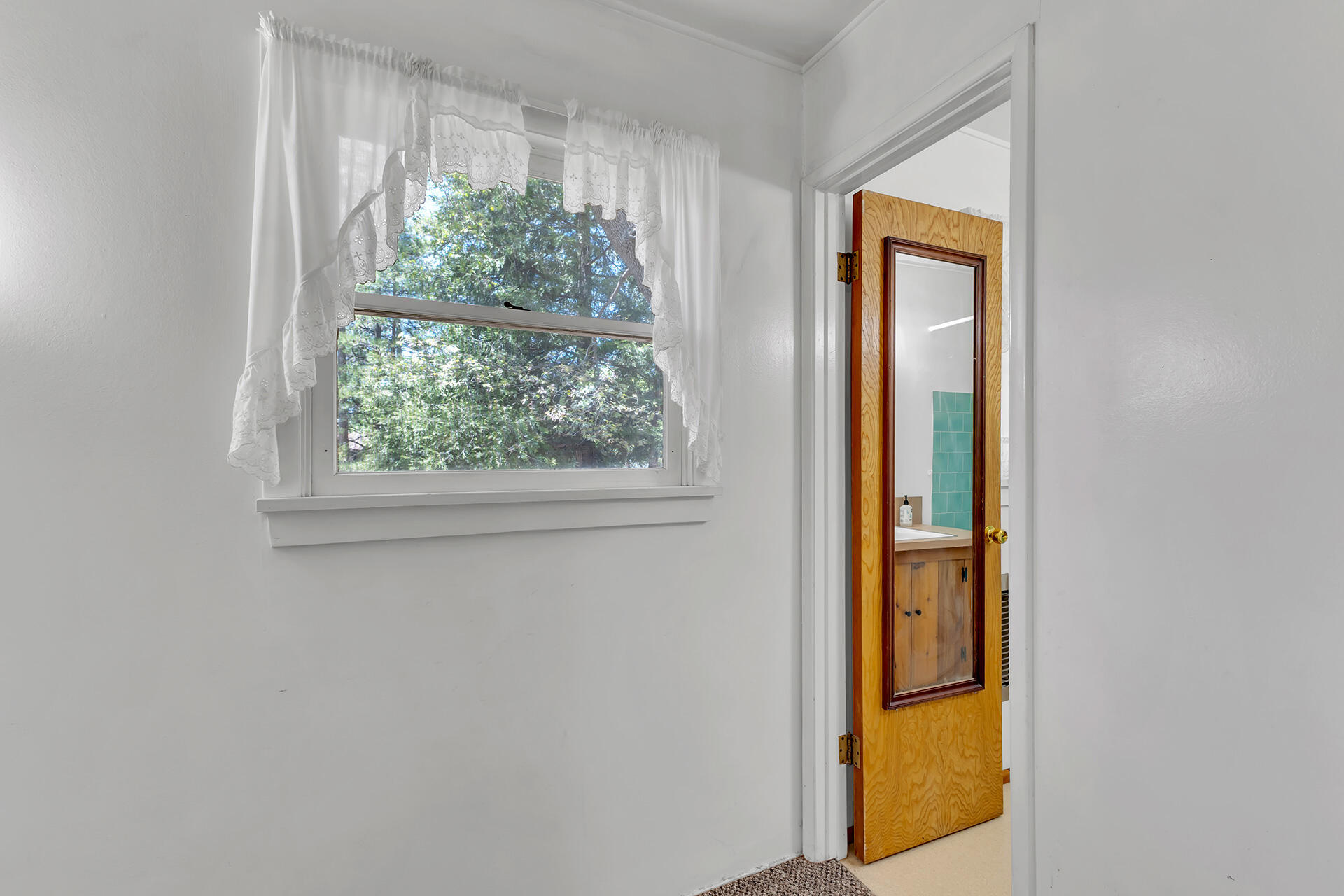 25270 Palomar Road Idyllwild, CA 92549 - Photo 34 of 60 a view of front door with wooden floor