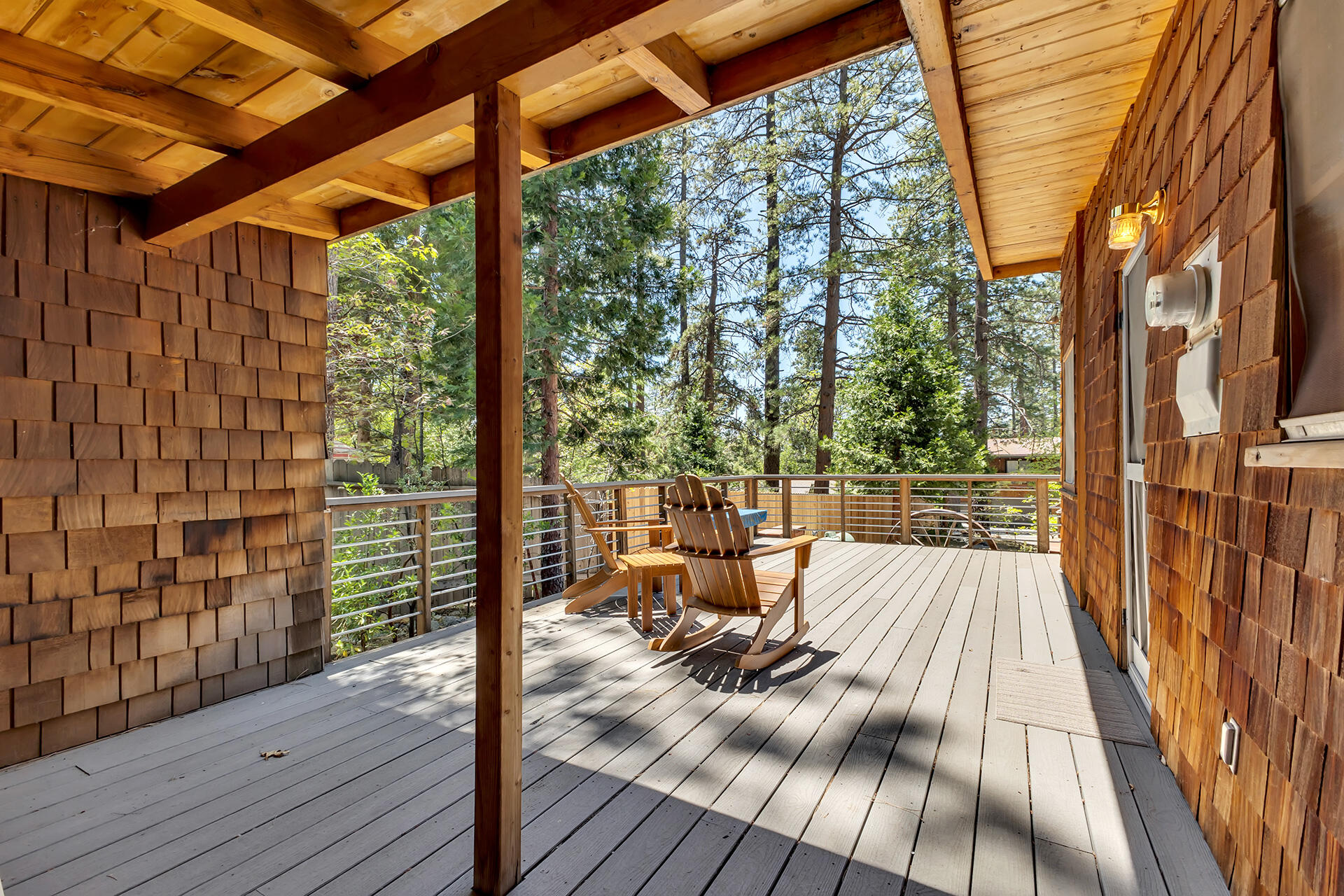25270 Palomar Road Idyllwild, CA 92549 - Photo 48 of 60 a view of balcony with couch and wooden floor