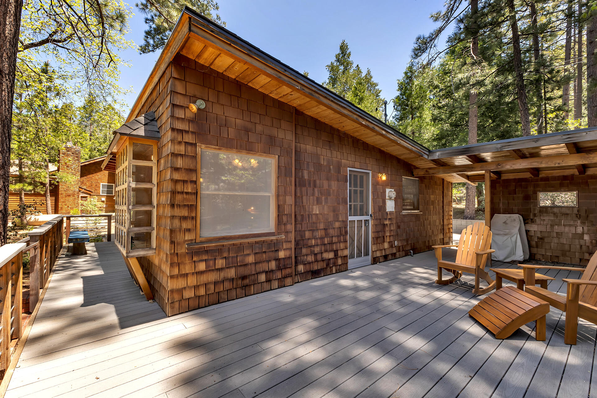 25270 Palomar Road Idyllwild, CA 92549 - Photo 56 of 60 a view of backyard with wheel chair and wooden floor