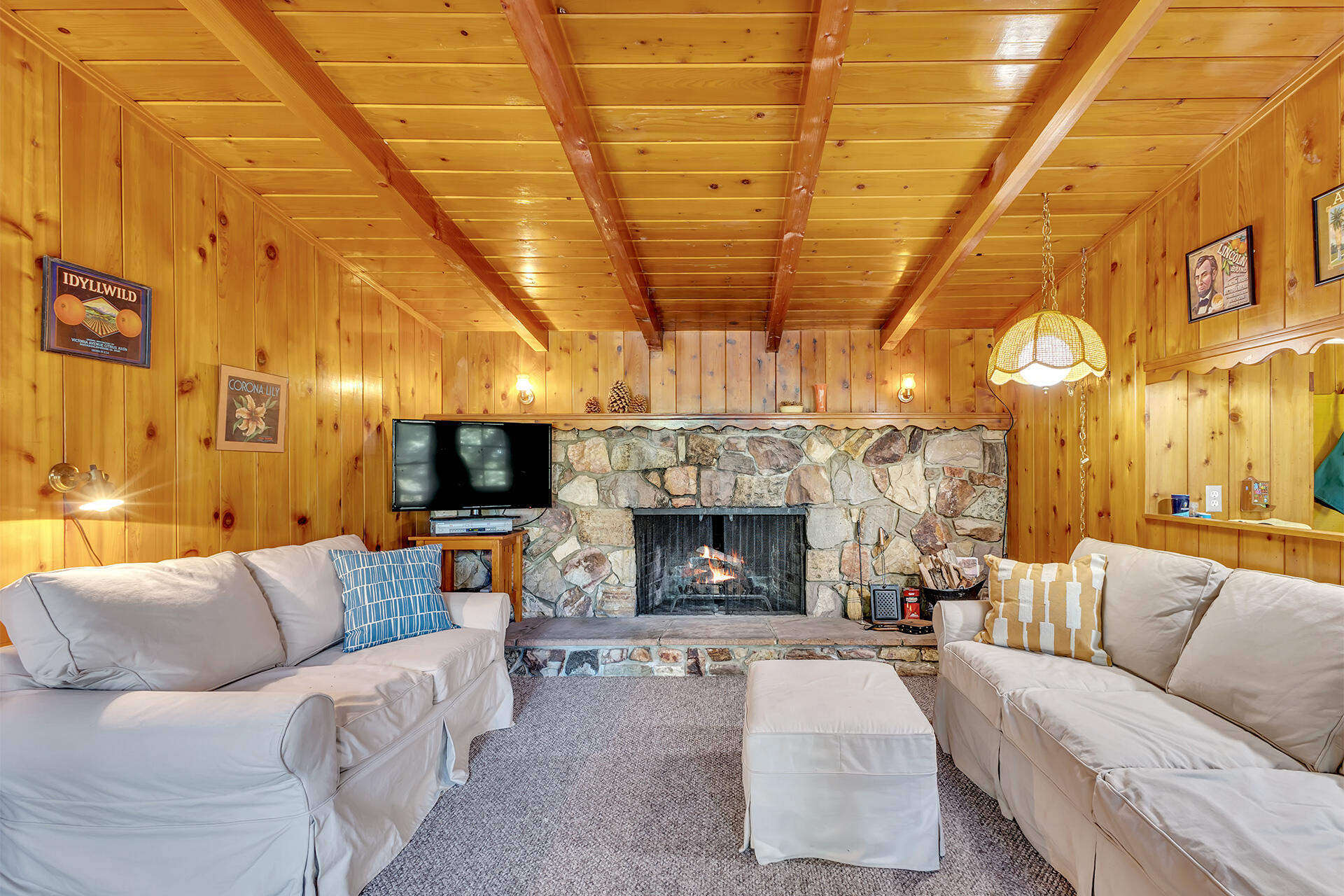 25270 Palomar Road Idyllwild, CA 92549 - Photo 9 of 60 a living room with furniture and a fireplace