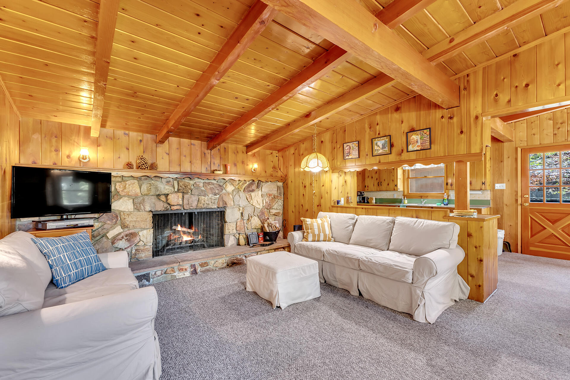 25270 Palomar Road Idyllwild, CA 92549 - Photo 10 of 60 a living room with furniture and a flat screen tv
