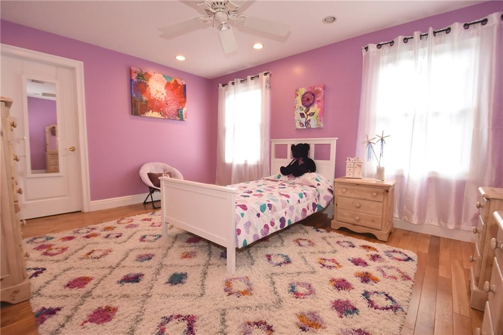 5050 East Willock Road Baldwin, PA 15236 - Photo 17 of 25 3rd bedroom with hardwood floors, and a large walk in closet
