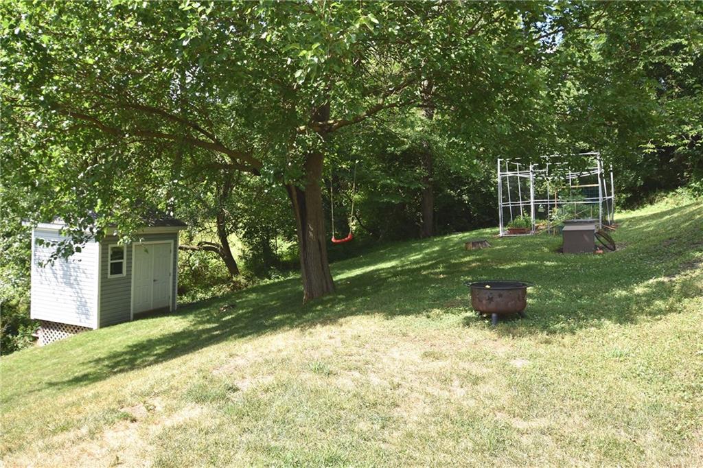 5050 East Willock Road Baldwin, PA 15236 - Photo 25 of 25 Yard with shed and garden area