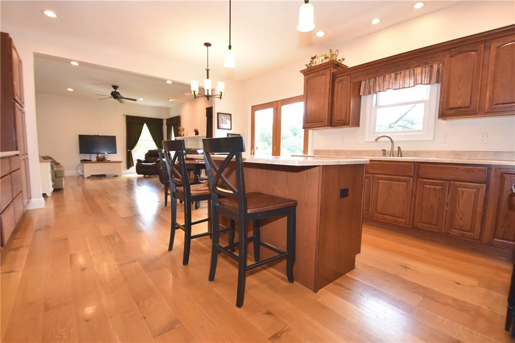 5050 East Willock Road Baldwin, PA 15236 - Photo 7 of 25 Look at those beautiful floors! Kitchen is completely open to the family room