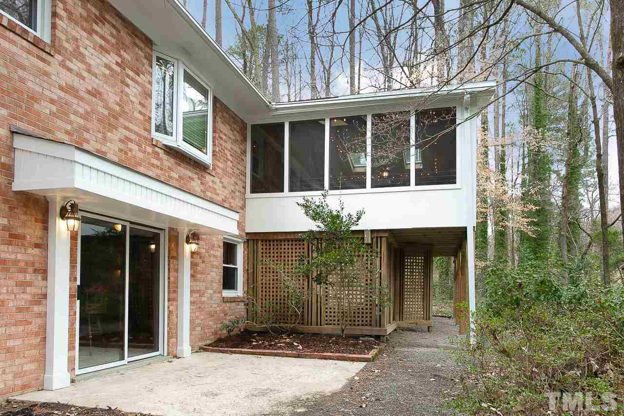4 Lucerne Lane Durham, NC 27707 - Photo 29 of 30 Sliding door to pub. Screen porch in view.