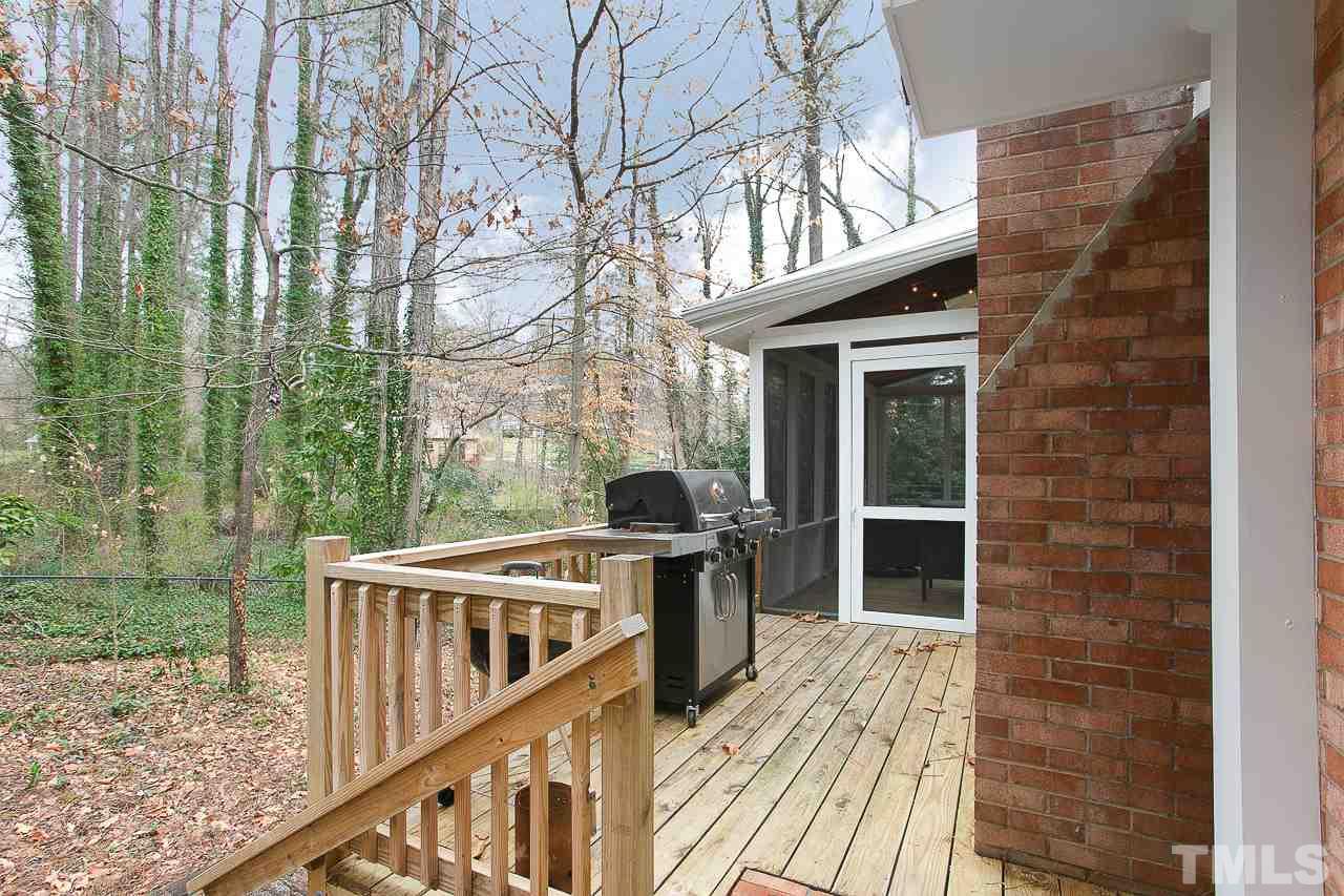 4 Lucerne Lane Durham, NC 27707 - Photo 30 of 30 Grilling porch off of the screen porch and kitchen. Steps to back yard.