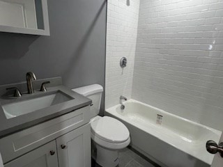 24 Judson Street, Unit 3 Boston, MA 02125 - Photo 16 of 18 a bathroom with a sink toilet and shower