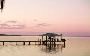 a view of a roof deck with a table and chairs
