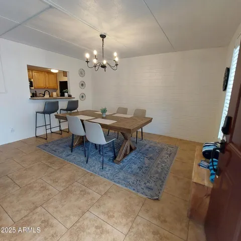 a workspace with furniture and a window