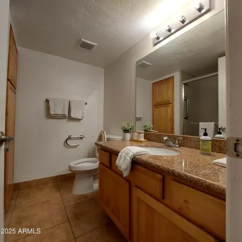 a bed room with a bed and a window