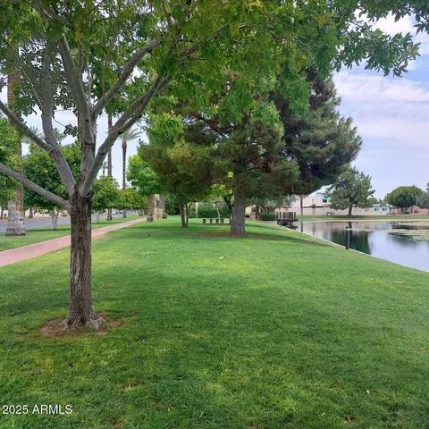 a view of a street with a building and a street