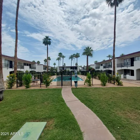 a view of patio with furniture