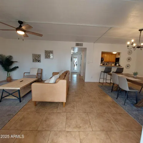a view of a dining room with furniture